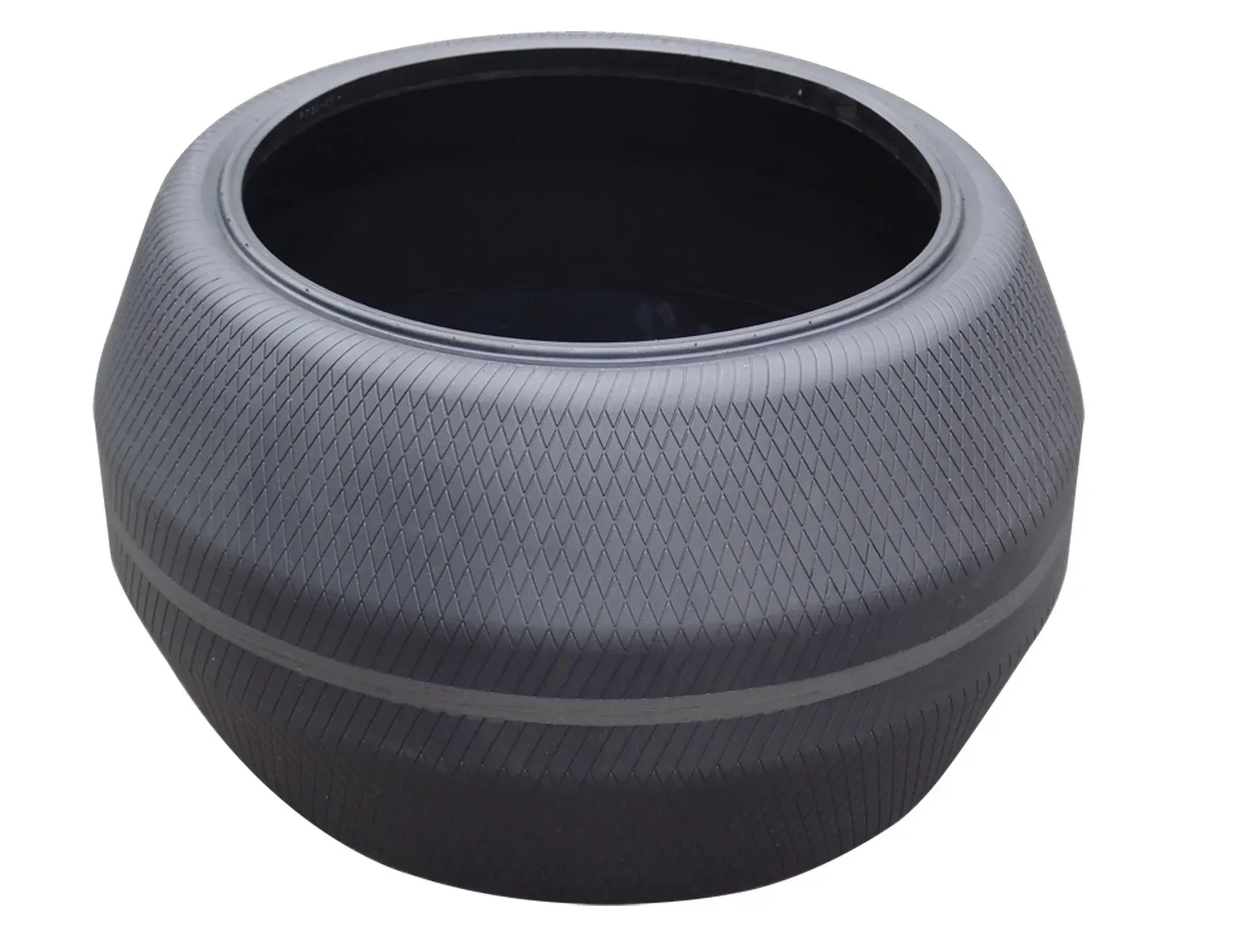 Unidentified tire curing bladder with diamond-pattern surface etching