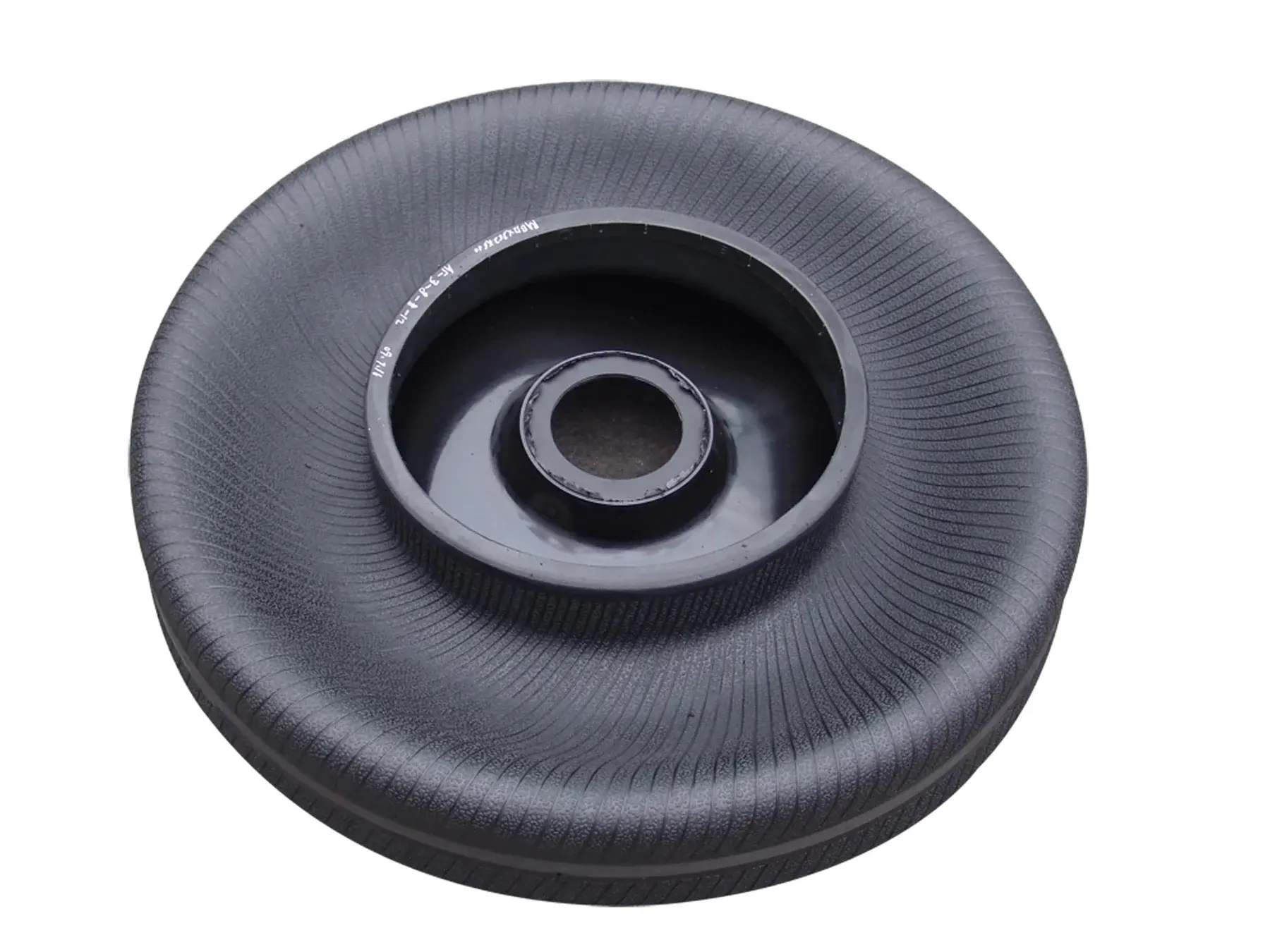 Top view of an unidentified tire curing bladder on a neutral background
